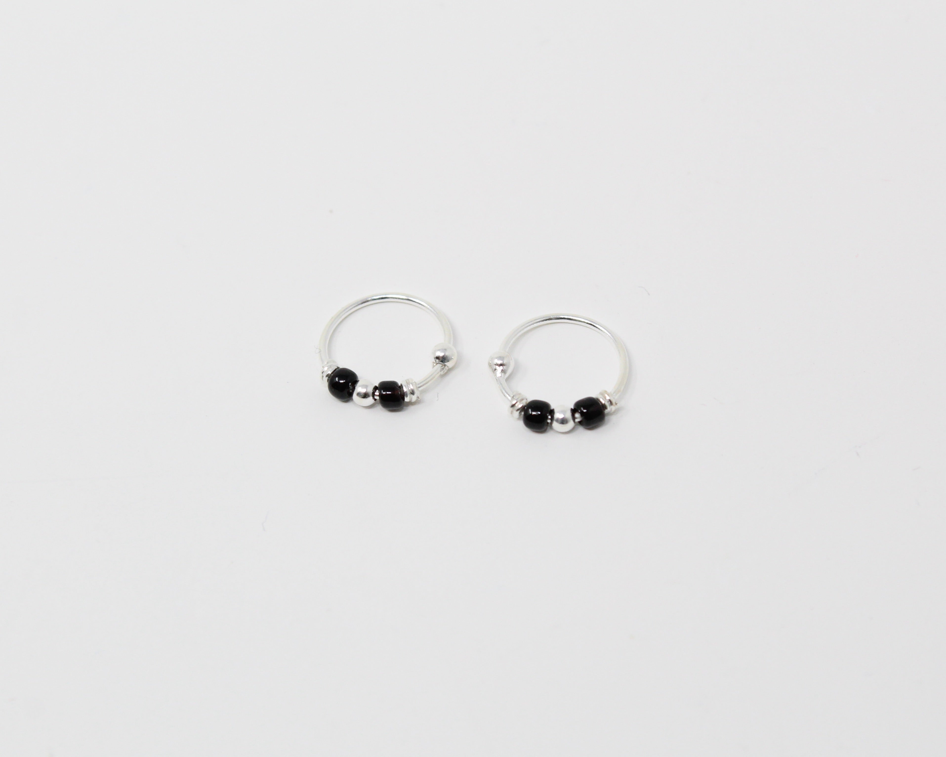 MARRA., anneaux argent sterling et billes.