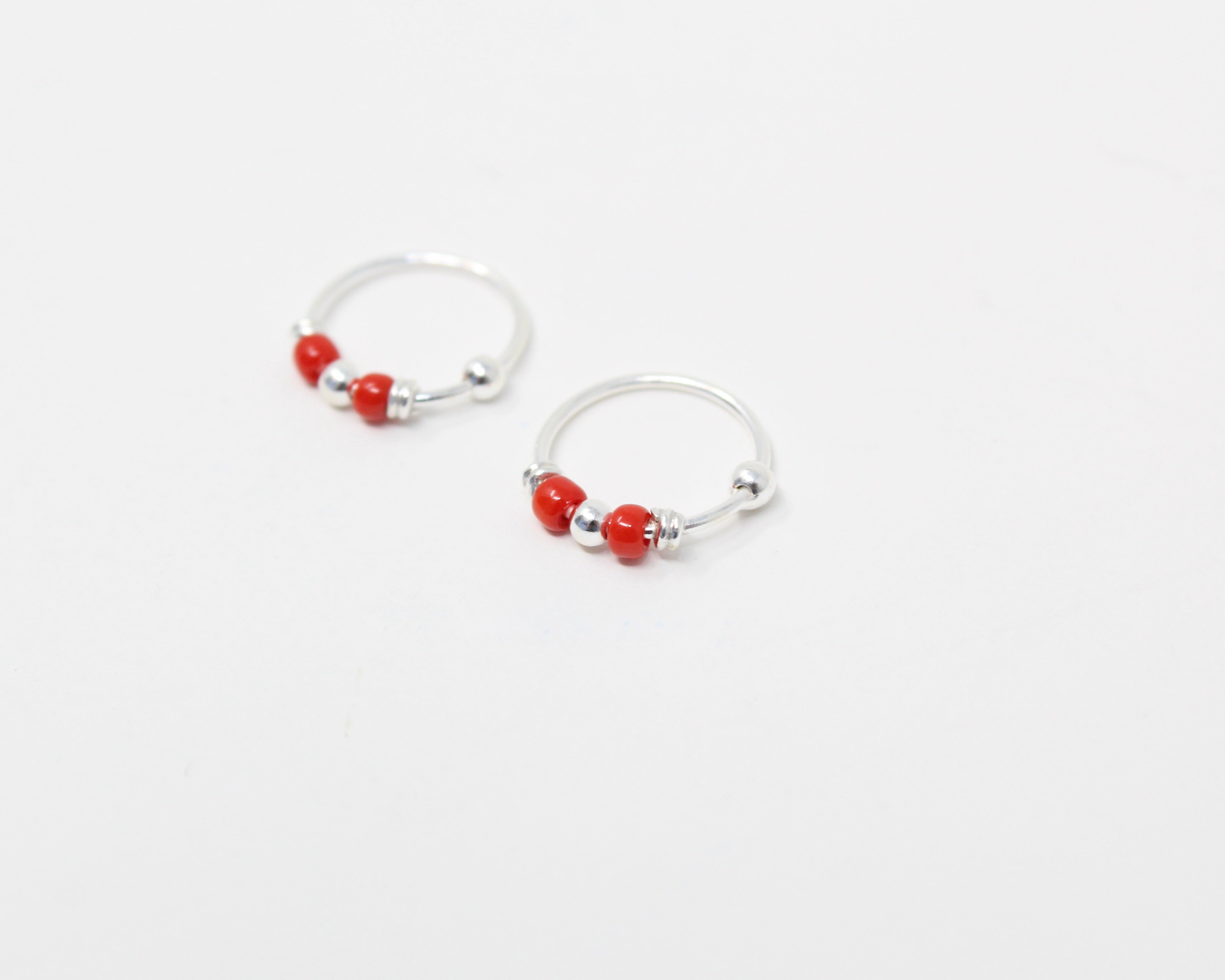 MARRA., anneaux argent sterling et billes.