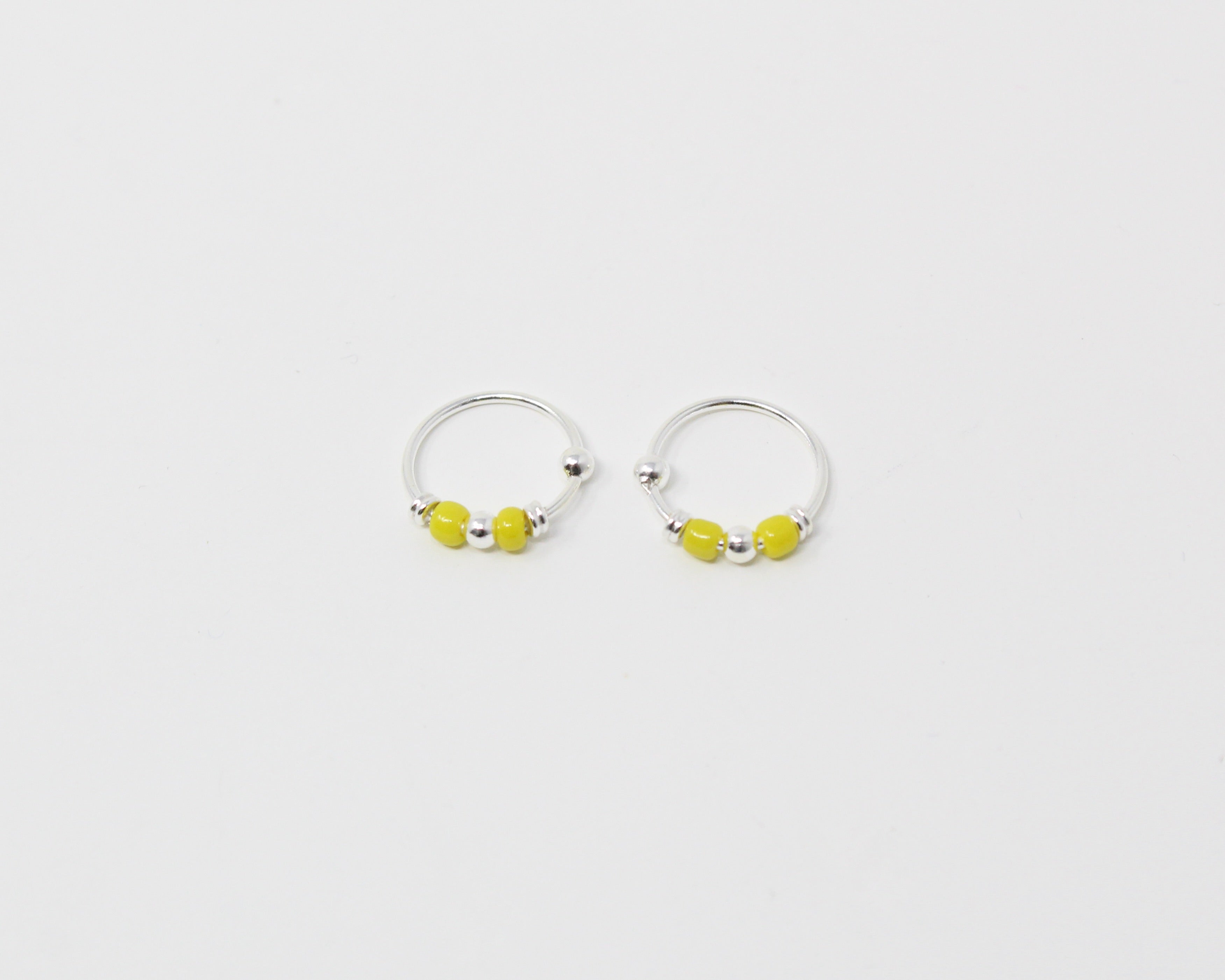 MARRA., anneaux argent sterling et billes.