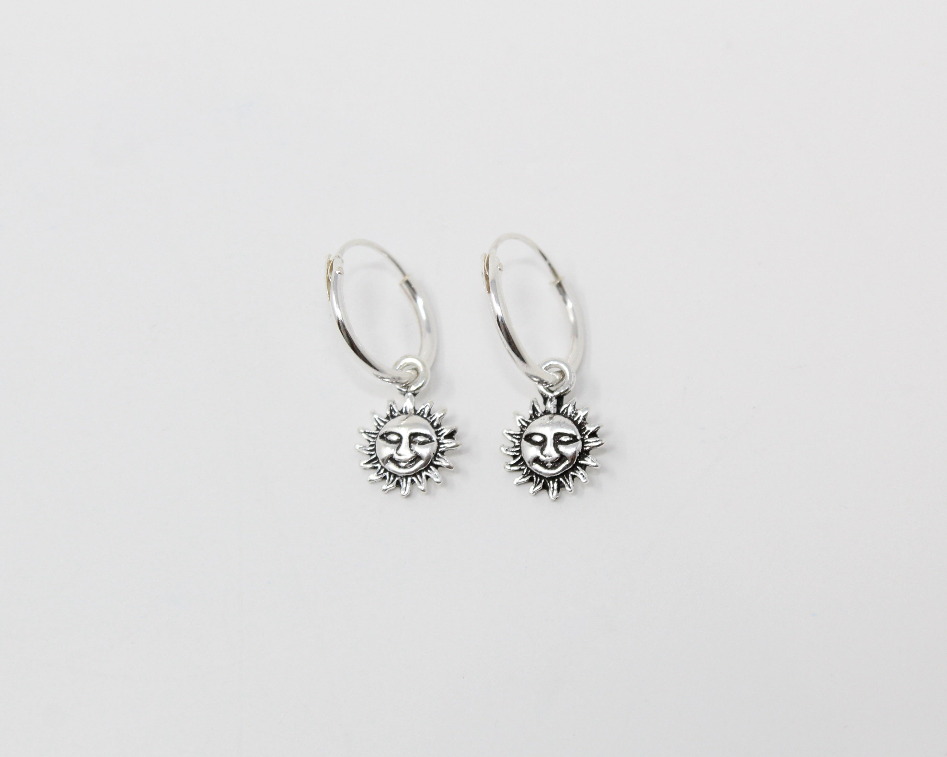SOLEIL, boucle d'oreille argent sterling.