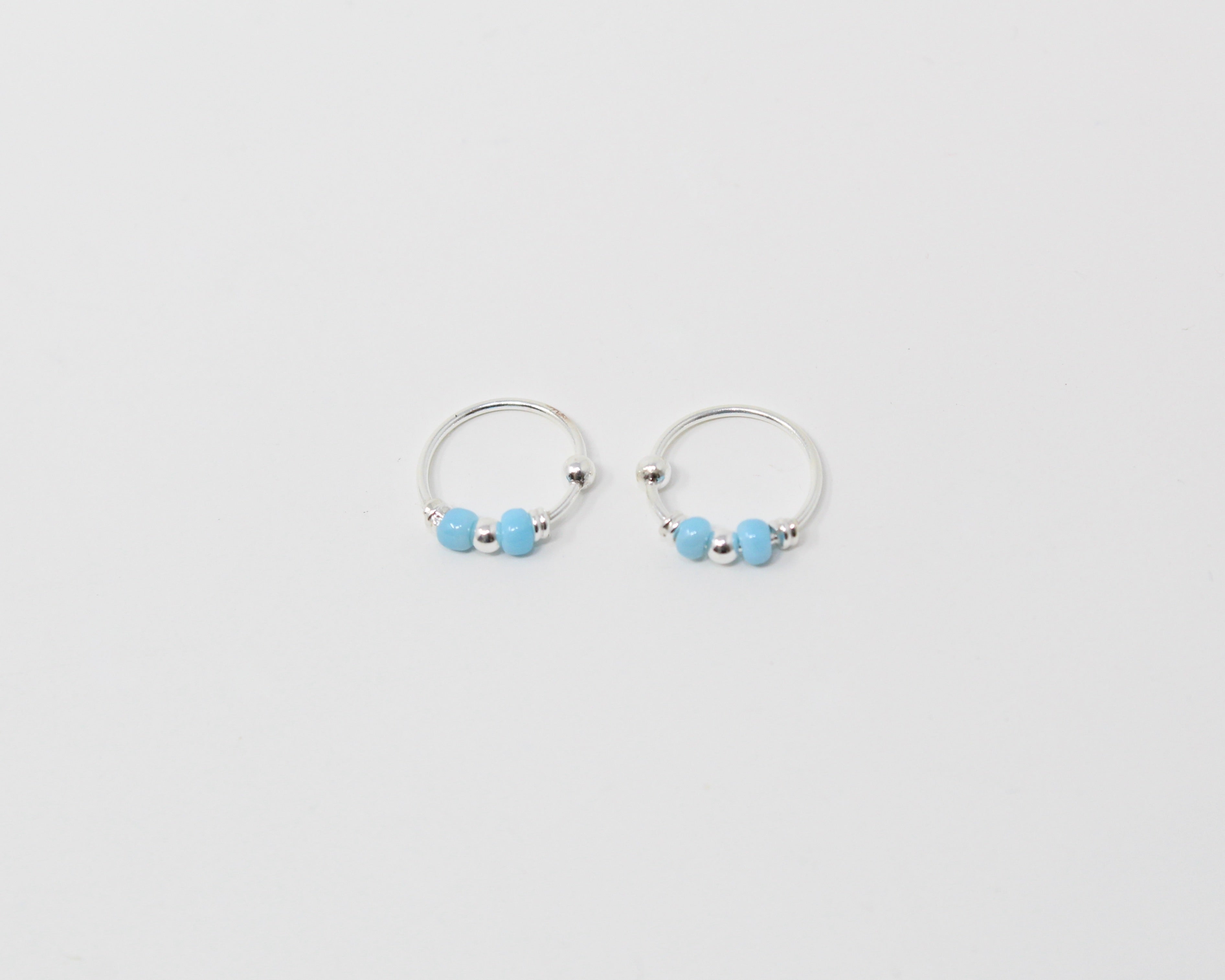 MARRA., anneaux argent sterling et billes.