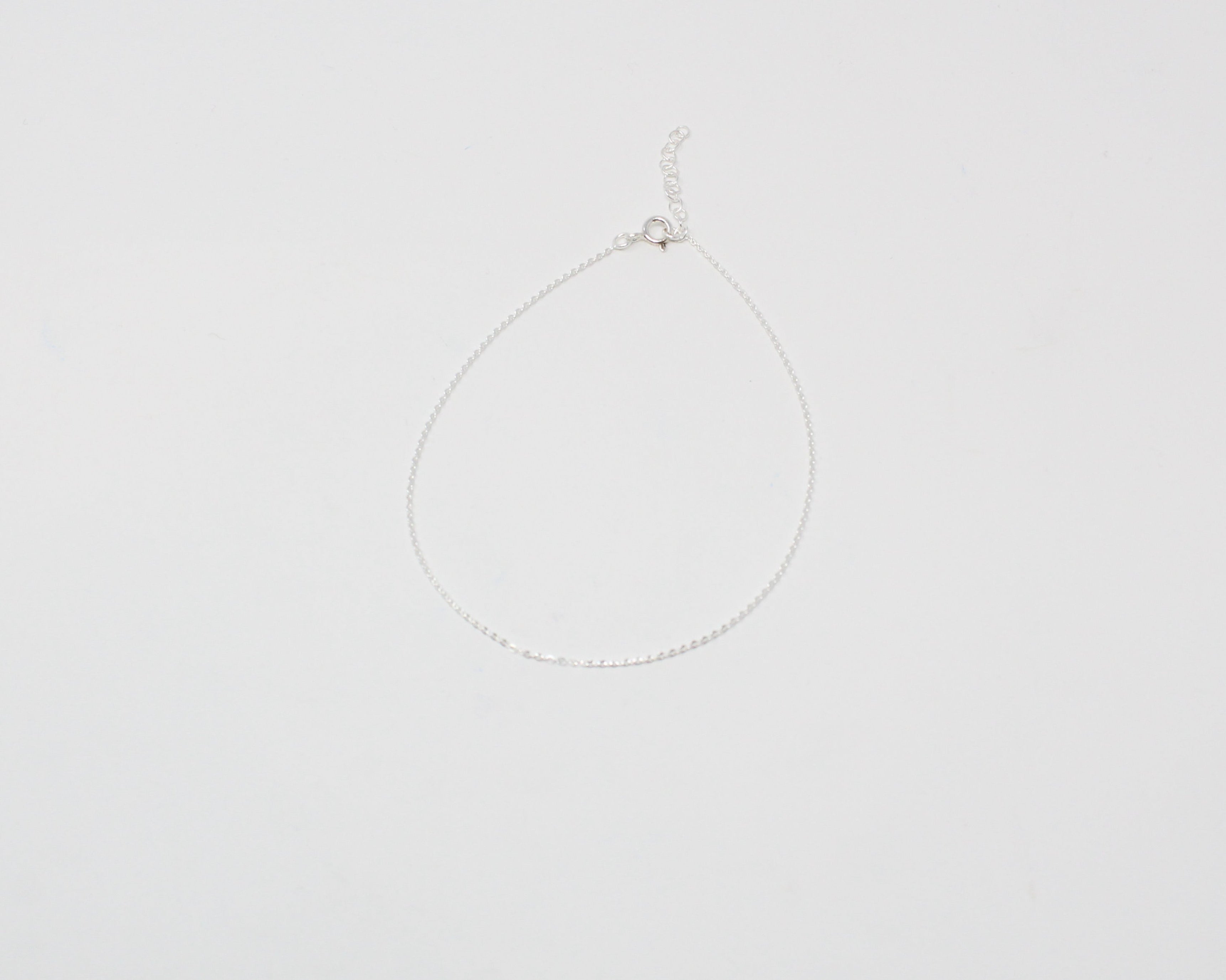 Brille, bracelet de cheville